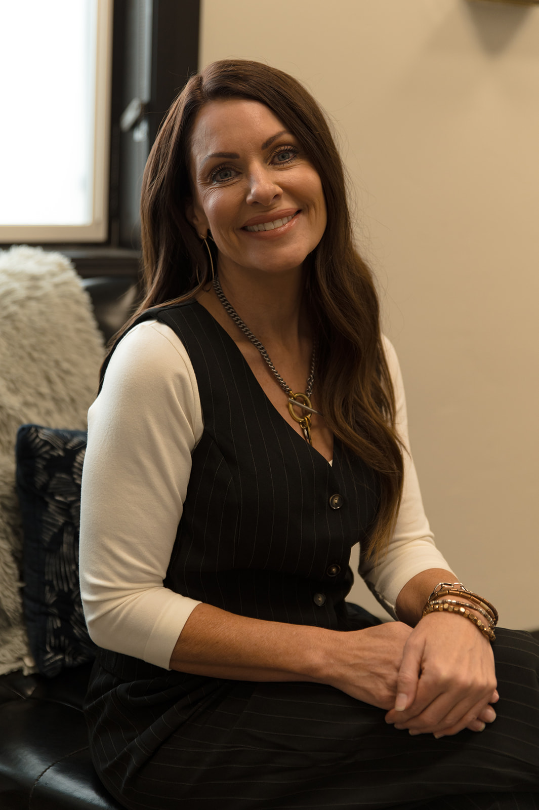 Christina Finnerty, NP, seated in the Ridgeline consult room.